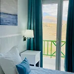 Relaxing Upper Floor Apartment- Exclusive Complex. *