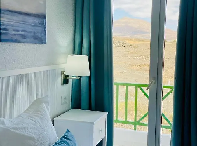 Relaxing Upper Floor Apartment- Exclusive Complex. *